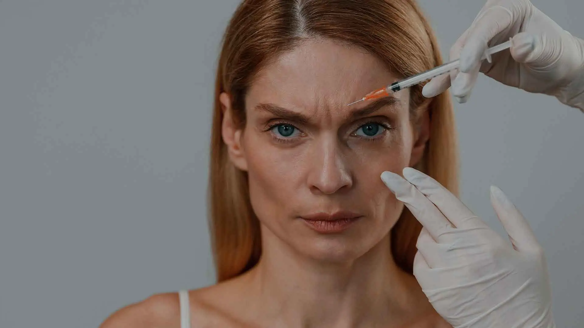 Dermal Fillers for Frown Lines monaz clinic