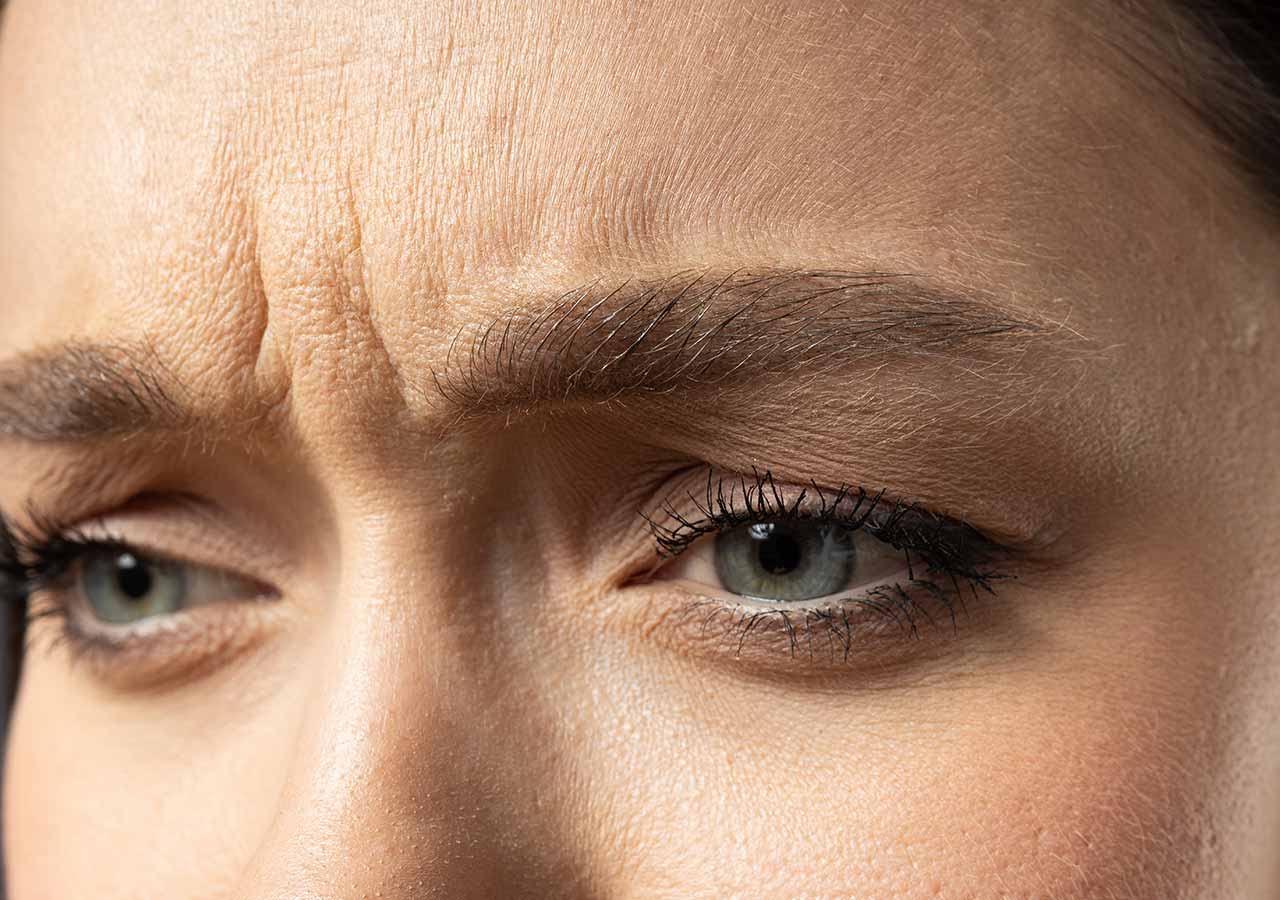 frown lines close up photo